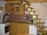 Vybavená kuchyňka v bungalovu